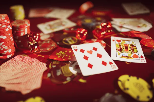 A man focused on his laptop with live stats in the background, highlighting the dedicated sports and gaming features of the 9777 mobile app.