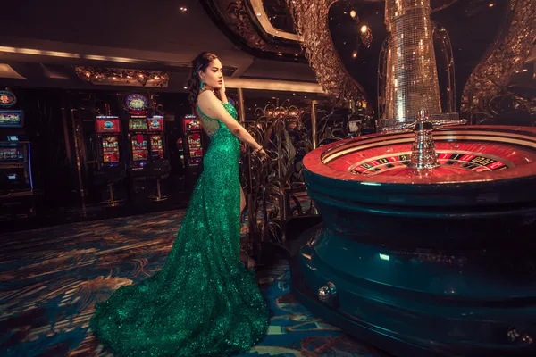 9777 Jackpot Slots — Spin for massive rewards A dramatic shot of winning sevens landing on a slot reel surrounded by shining gold coins, symbolizing big wins.